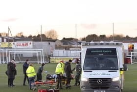 Adam McCracken was unconscious for a period and was taken to hospital as a precaution before the match was abandoned