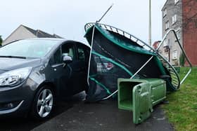 Storm Isha blows over a trampoline onto a car on Teviot Street, Bantaskine.