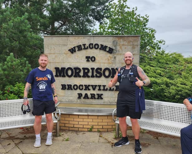 Jamie and Andy take a breather at the site of Falkirk FC's former Brockville stamping ground during their five stadium challenge (Picture: Submitted)