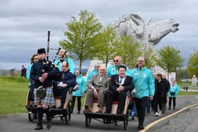 Piper Harris Cooper, 12, led the procession for the official opening of the Cycling Without Age Scotland hub at the Helix Park.  (Pic: Michael Gillen)