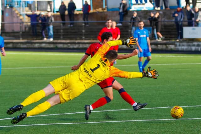 Rhys Armstrong slots home to put Braves one goal ahead (Pictures: Scott Louden)