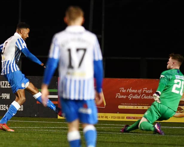 Nathan Austin chips David Wilson at the death (Pictures: Michael Gillen)