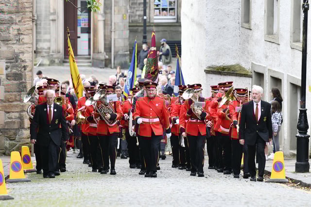 The Reed Band lead the way up Kirkgate.