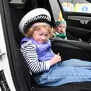 Let's go catch some bad guys - Katie Watt, 3, and Finlay Watt, 1, could be the future of law enforcement or they may just be having fun at Saturday's open event