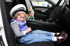 Let's go catch some bad guys - Katie Watt, 3, and Finlay Watt, 1, could be the future of law enforcement or they may just be having fun at Saturday's open event
