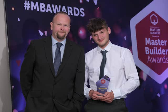 Barry Dawson, CITB Senior Customer Engagement Manager, presents Noah Archibald of Haldane Construction Services with the Apprentice of the Year Award. (Pic: Tina Norris)