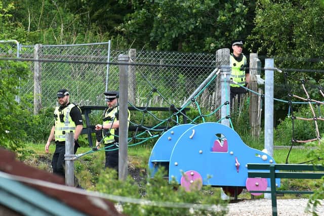 The tragic discovery say police tape off an area off Coneypark Crescent near a playpark and allotments close to Glenskirlie Castle. Pic: Michael Gillen