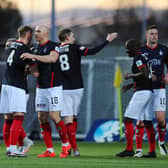Conor Sammon is congratulated by his colleagues after putting Falkirk 2-0 up against Peterhead on Saturday at Falkirk Stadium, just a whisker away from half time (picture by Michael Gillen)