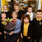 Anne Bell, school crossing patrol person for more than 22 years in Carronshore, was given a special assembly by youngsters in local primary school.