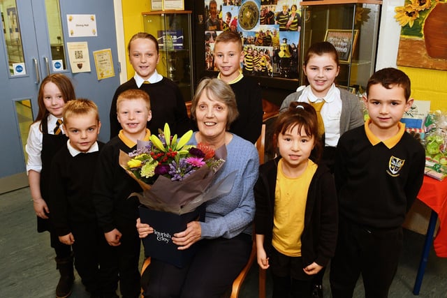 Anne Bell, school crossing patrol person for more than 22 years in Carronshore, was given a special assembly by youngsters in local primary school.