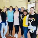 Staff and supporters from Certas Energy volunteered to help out at the Strathcarron Hospice charity shop.  (pic: submitted)