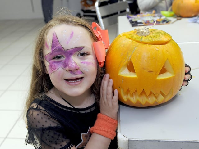 Anna McEleny with her pumpkin.