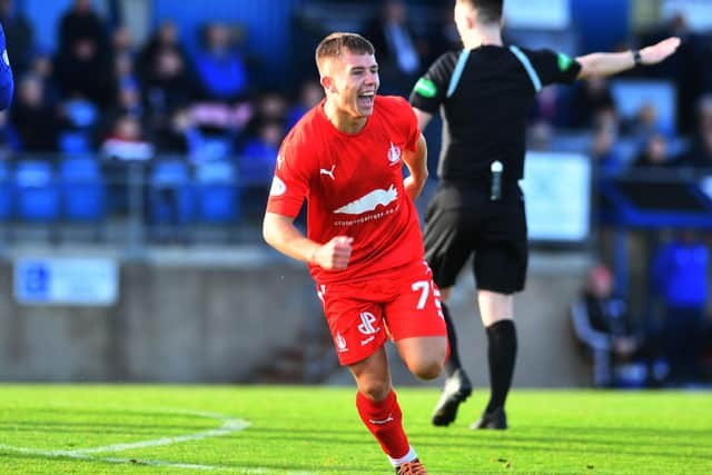 Kai Kennedy celebrates his strike that crashed in off the goalkeeper to make it 3-0