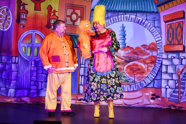 Wishey Washey (Stewart Borthwick) and Widow Twankey (Derek Easton) form a comical double act in Larbert Musical Theatre's performance of Aladdin. Picture: Michael Gillen.