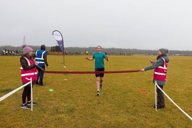 First finisher over the line at the inaugural Parkrun.