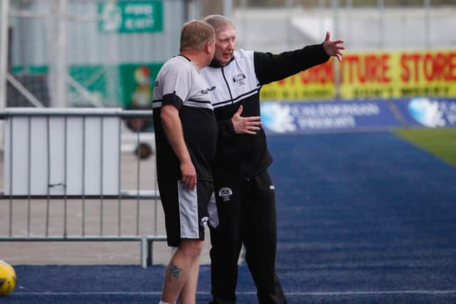 Shire assistant manager John Brownlie on the touchline