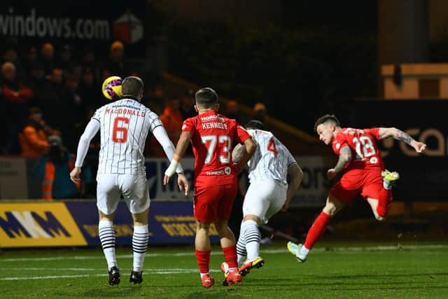 Gary Oliver's early header from a Callumn Morrison cross forced Deniz Mehmet into a save (Pics by Michael Gillen)