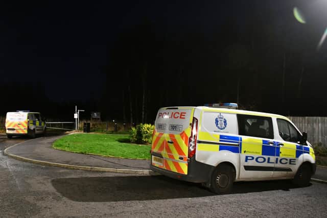 A police presence remained last night at the entrance to Cobblebrae Community Woodland which leads to the River Carron. Pic: Michael Gillen.