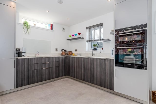 The kitchen has a superb range of floor and wall units with non permeable engineered stone worktops and appliances including fridge/freezer, dishwasher, 5-ring electric hob with hood over, oven and grill.