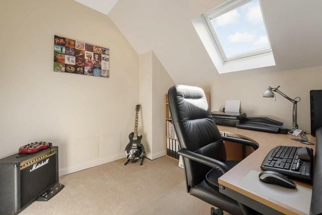 There are three bedrooms on the upper floor, one of which is currently kitted out as a spacious office.