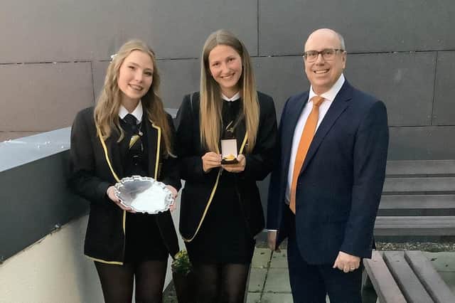 Proxime Accessit Bethany Spowart, Dux Lucy Hume and headteacher Mr Brian Millar.  (pic:submitted)