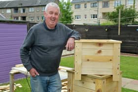 One man flower box building "machine" Malcolm "Malky" Finlayson has helped to raise over £2000 for Strathcarron Hospice through his woodworking endeavours
