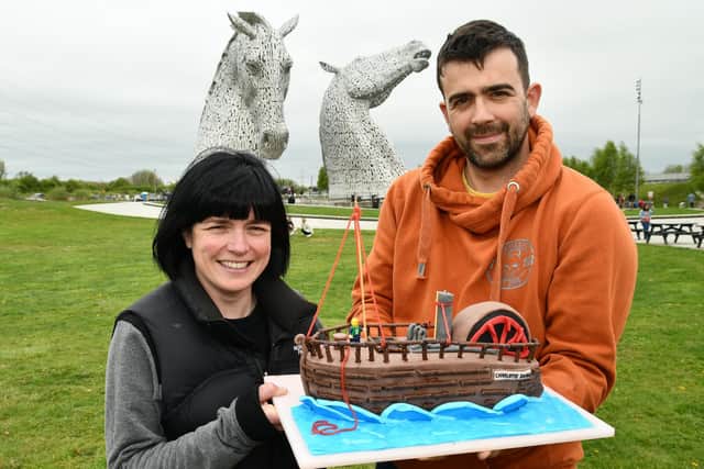Baker Chris Hughes with Charlotte Dundas steam ship cake decorated by his wife Allana Hughes. Pic: Michael Gillen