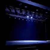 The ghost light shines down on a empty stage at Falkirk Town Hall