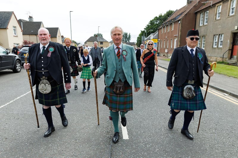 This year's Airth Highland Games chieftain Alan Simpson leads the parade through Main Street
(Picture: Mark Ferguson, National World)