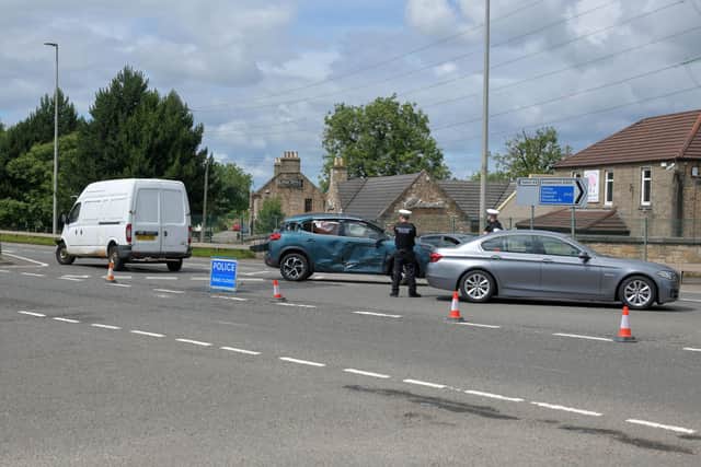 Police were called to a two-vehicle crash on the A9 in Polmont this afternoon which resulted in a woman being taken to Forth Valley Royal Hospital. Picture: Michael Gillen.