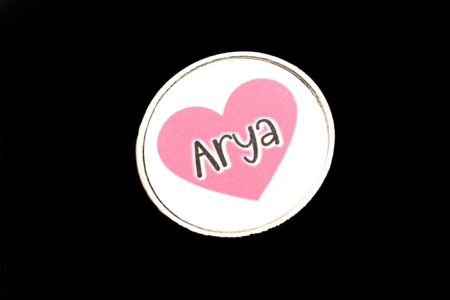 Lots of people had pin badges to support Arya and her family.