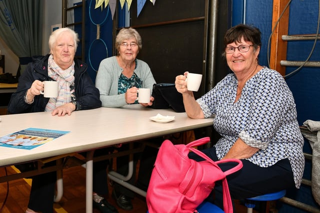 More happy coffee drinkers supporting the primary school's fundraiser.