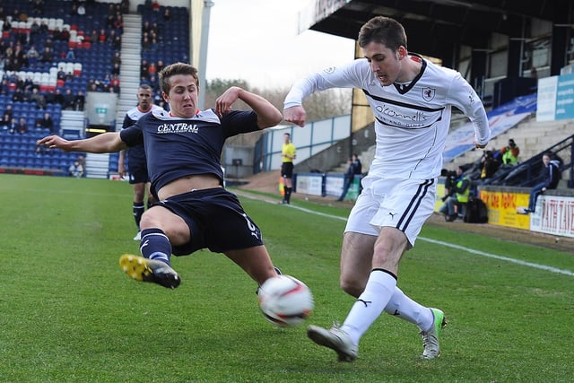 Calum Elliot gets the cross in front of Will Vaulks