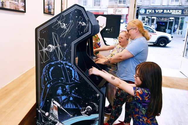 Youngsters get to experience what gaming was like back in the 1980s and just how many 50 pence pieces it took to bring down the evil Empire