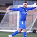 Tom Grant celebrates scoring for BU (Photo: Alan Murray)