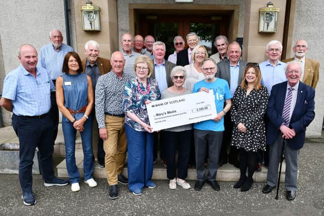 Rotary Club of Grangemouth donation to Mary's Meals with Ann Allison and Janet Kinniburgh, both international committee members, presenting the cheque to John Helliwell, Mary's Meals volunteer. Pic: Michael Gillen