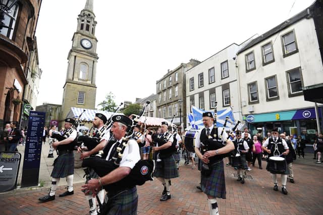 Pipers marched through the heart of the town on Saturday as part of the commemorations