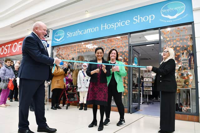 New Strathcarron charity shop opened by Baljit Dhillon watching on David Rennie, area manager; Karen Drummond, store manager; and Fiona Hannah, deputy area manager. Pic: Michael Gillen