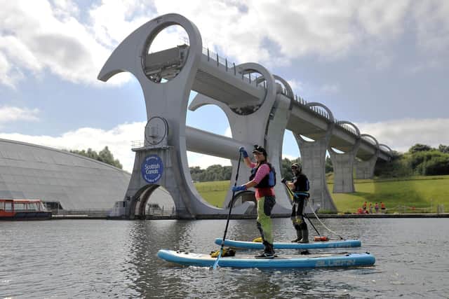 The Rubbish Paddlers Charlotte Megret and Neil Smith cleared a section of the Forth and Clyde Canal between The Falkirk Wheel and Bonnybridge with the help of volunteers. Picture: Michael Gillen.