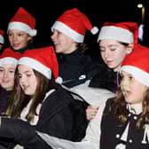Youngsters from Carronshore Primary's choir entertained for the crowd at the annual Carronshore Christmas light switch on on December 1, 2023.  (Pic: Mark Ferguson)