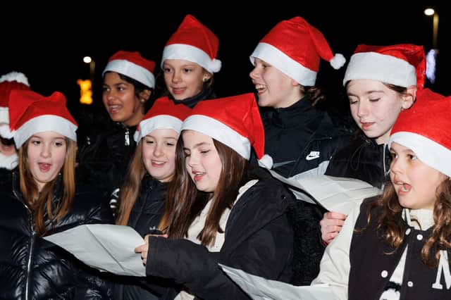 Youngsters from Carronshore Primary's choir entertained for the crowd at the annual Carronshore Christmas light switch on on December 1, 2023.  (Pic: Mark Ferguson)