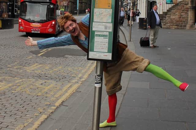 Fringe actor Arron Usher on the Royal Mile for the Fringe before lockdown hit