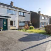 With plenty of room to park your cars, as well as for guests, this is just one of many features that help to sell this pretty home.