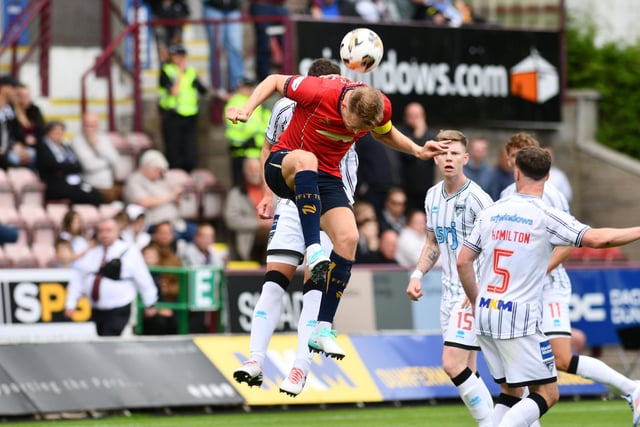 Captain Coll Donaldson leaps for a high ball at East End Park