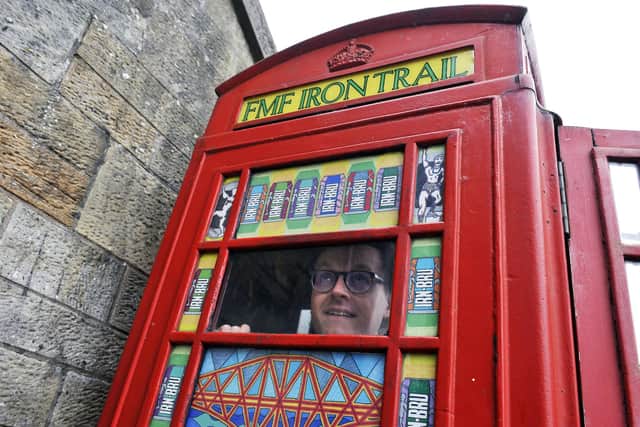 Edinburgh artist Richard Duffy worked with Falkirk Made Friends to revamp the Carron Ironworks-made K6 phone boxes. Picture: Michael Gillen