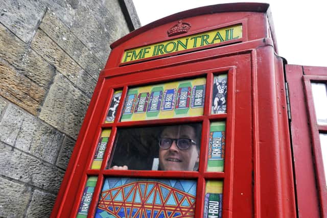 Edinburgh artist Richard Duffy worked with Falkirk Made Friends to revamp the Carron Ironworks-made K6 phone boxes. Picture: Michael Gillen