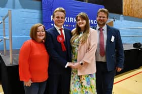 New Falkirk MP Euan Stainbank pictured with his mum Susan McElroy, girlfriend Innes Murray and dad Duncan Stainbank. Pic: Michael Gillen