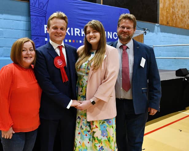 New Falkirk MP Euan Stainbank pictured with his mum Susan McElroy, girlfriend Innes Murray and dad Duncan Stainbank. Pic: Michael Gillen