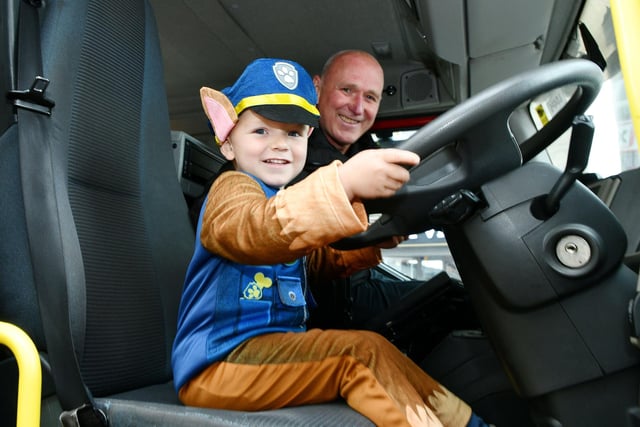 Logan Baird, 3, dressed up as Chase from PAW Patrol with Paul Harvey, SFRS watch commander for Falkirk and West Lothian.