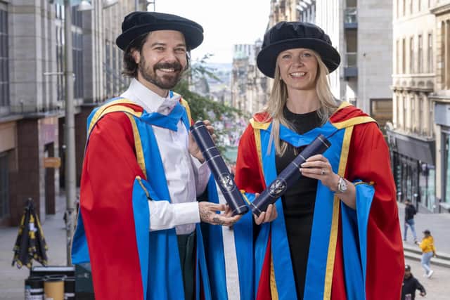 Honorary graduates Vicky Wright MBE with hter Doctor of Science and Simon Neil of Biffy Clyro who received a Doctor of Letters (DLitt) at Glasgow Caledonian University, ceremony today